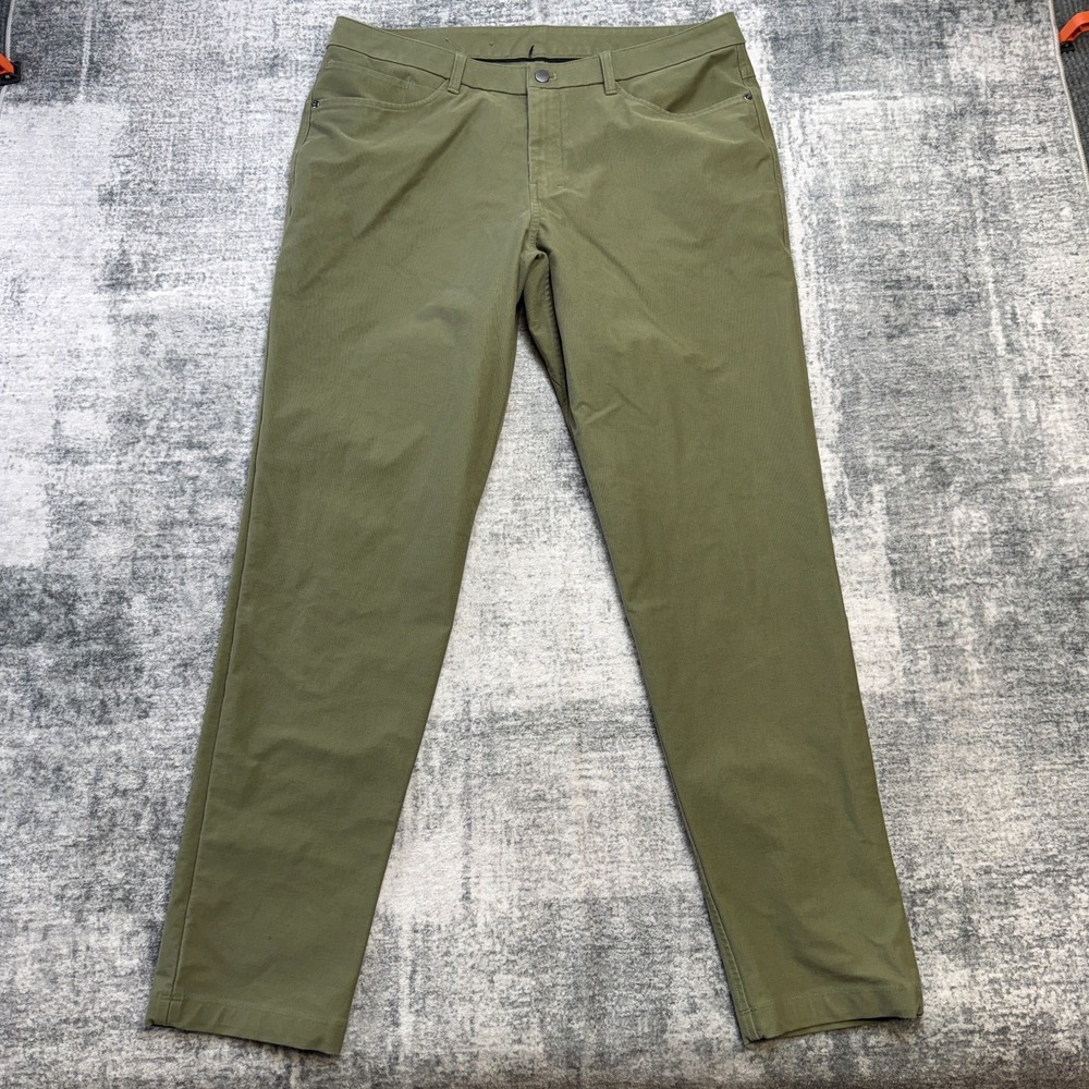 Lululemon ABC Pants Men 36 Olive Green Slim Stretch Utilitech Reflective Commute
